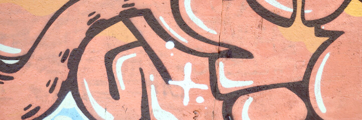 Colorful background of graffiti painting artwork with bright aerosol outlines on wall. Old school...