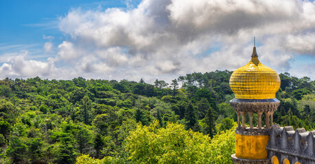 Wide-angle exterior view of the watchtower with dome decorated with yellow tiles of the Pena...