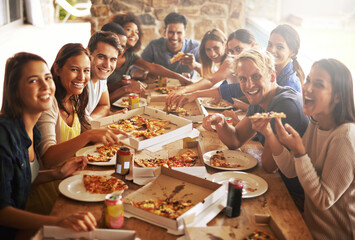 Group, friends and party with fast food, celebration and diversity for joy or fun with youth. Men, Women and pizza with drink, social gathering and snack for lunch or eating at italian pizzeria