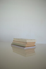 some books on a white table