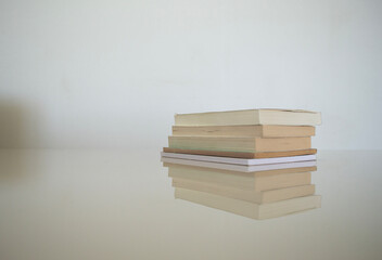 some books on a white table