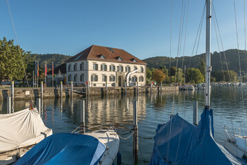 Fototapeta na wymiar Marina and old customs house in Bodman-Ludwigshafen on Lake Constance, Baden-Württemberg, Germany,