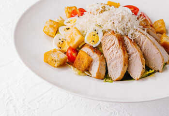 Fresh caesar salad in white plate