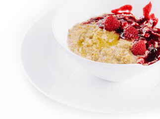 Oatmeal rustic porridge with raspberries jam
