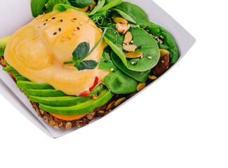Sandwich with avocado and poached egg