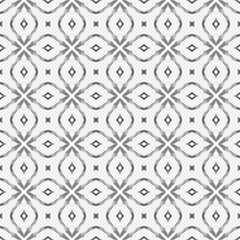 Ikat repeating swimwear design. Black and white