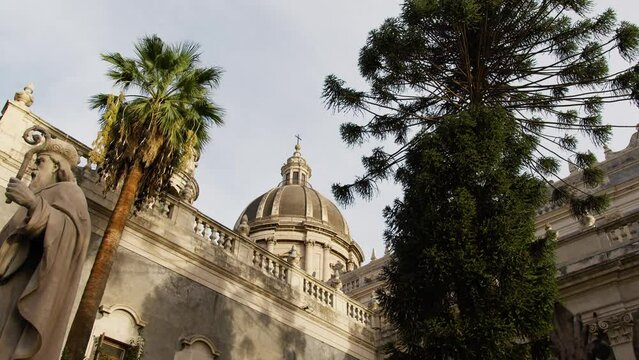Church Dome in catania surrounded by trees 