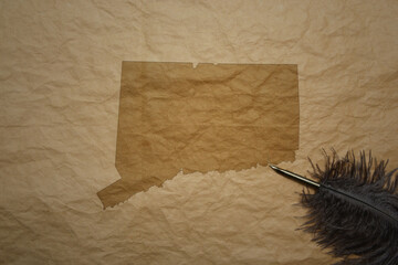 map of connecticut state on a old paper background with old pen