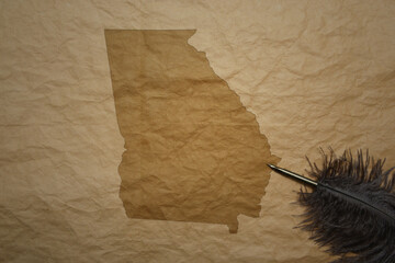 map of georgia state on a old paper background with old pen - obrazy, fototapety, plakaty
