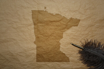 map of minnesota state on a old paper background with old pen