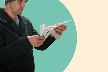 Disappointed male customer looking at receipt total after shopping, Economic puzzle: Man examines a sales receipt, surprised by the unexpected surge in prices