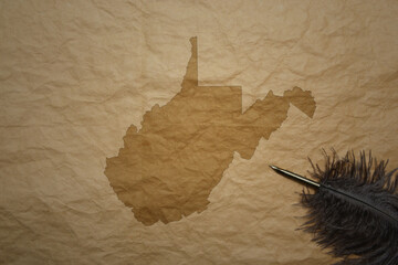 map of west virginia state on a old paper background with old pen
