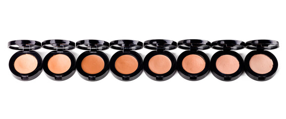 Cosmetics, powder and makeup product for beauty with texture in container, studio and white background. Aesthetic, transformation and choice of shades or colour for application of foundation pallet