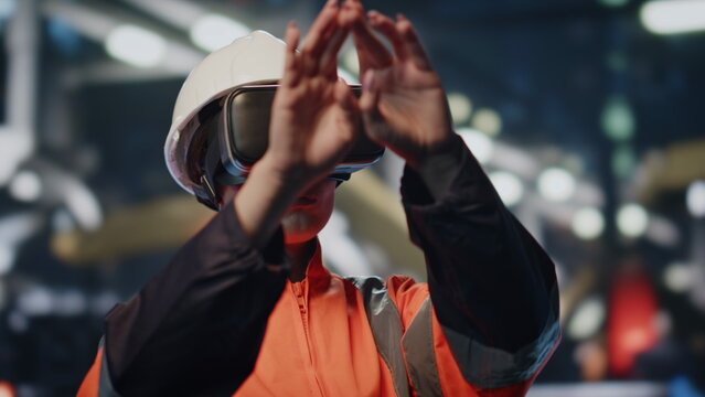 Glasses engineer controlling virtual reality interface by hands close up.