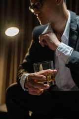 Businessmen in suits drinking  Celebrate whiskey.
