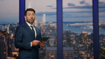 Fototapeta premium Elegant newscaster presenting daily breaking news in television show close up.