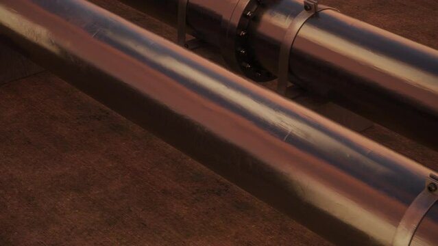 Industrial Oil or Gas Pipeline.
Black oil or gas transfer pipe with the camera moving slowly along its side. Ultra HD 4K 3840x2160 A seamless loopable animation.