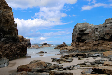 Fototapeta na wymiar Playa de las catedrales in Spain. Beatiful beach with rocks and sand