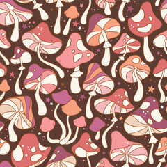 Seamless vector pattern with hand drawn groovy vintage and mushrooms and stars. Perfect for textile, wallpaper or print design.