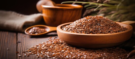 Nutritious Flax Seeds Served in a Bowl with a Wooden Spoon - Healthy Eating Concept