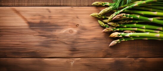 Fresh Organic Asparagus Bundle Arranged on Rustic Wooden Table with Natural Sunlight - Powered by Adobe