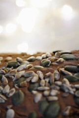 Close-up of homemade whole wheat bread cut with sunflower seeds, pumpkin.