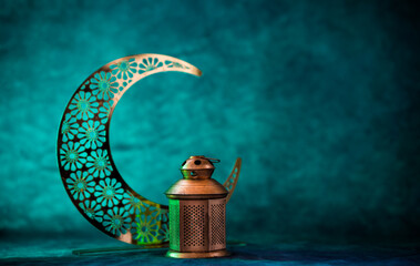 Crescent moon with lantern Ramadan Kareem and Eid Mubarak concept background