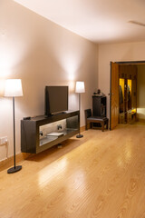 Spacious and Modern Bedroom with Warm Wood Tones and Elegant Decor