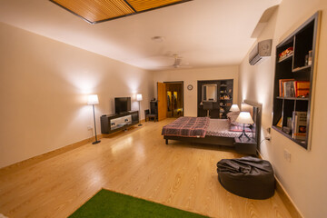 Spacious Bedroom with Elegant Wooden Detailing