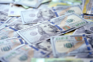 Closeup background of money banknote hundred dollars. Background with USA dollar and European currency euro notes. Money texture