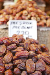  many date fruits display for sale at local market 