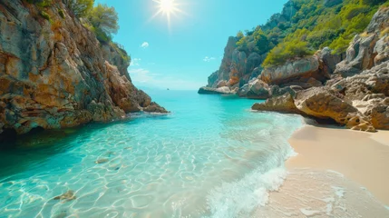 Fototapeten A serene beach with turquoise waters gently washing onto the white sand, flanked by rugged cliffs and lush greenery under a clear blue sky with the sun shining brightly. © ChubbyCat