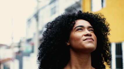 Believing African American Woman Feeling Presence of Higher Power, Inspired Skyward Close-Up Face...