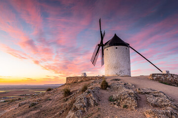 Stunning Sunrise at the Windmills of Consuegra, Toledo, Spain - obrazy, fototapety, plakaty