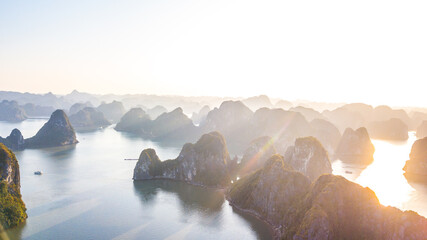 Aerial view floating fishing village and rock island, Halong Bay, Vietnam, Southeast Asia. UNESCO...