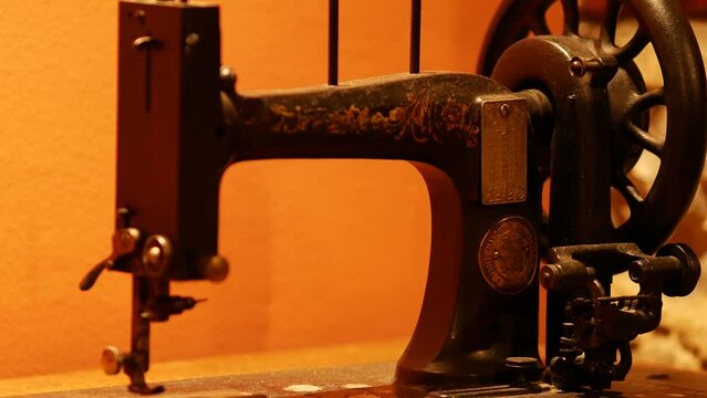 Vintage foot operated mechanical sewing machine from the late 19th century. Antique Seidel and Naumann Hand crank Transverse Shuttle Sewing machine. Istria, Croatia - November 25, 2023