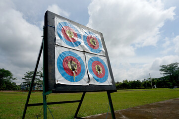 The broken archery target board. This is the target that the archer's aim their arrows when they...