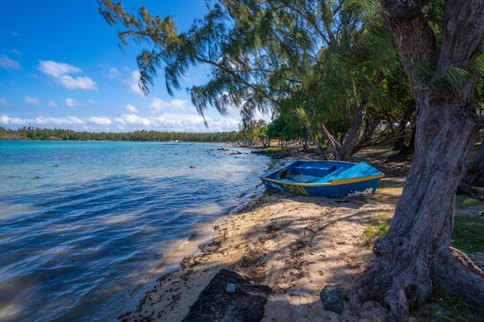 View of Anse La Raie Beach and turquoise Indian Ocean on sunny day, Mauritius