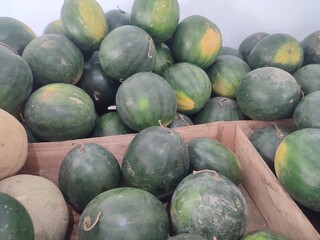 Stacks of watermelons in the market