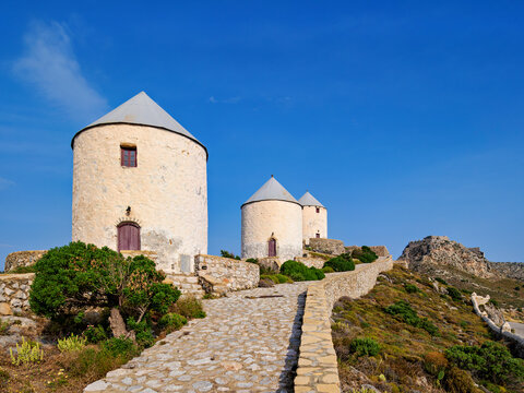 Windmills of Pandeli with Medieval Castle in the background, Leros Island, Dodecanese