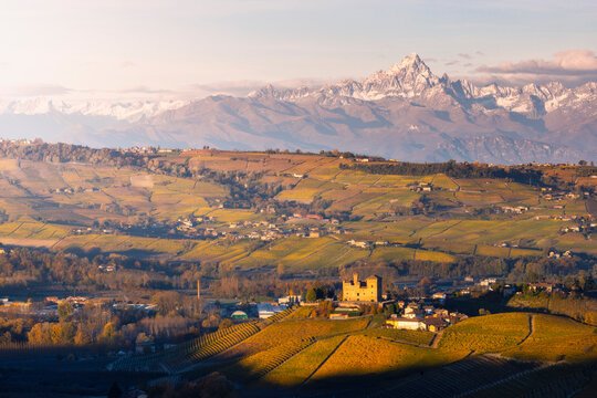 Grinzane Cavour and Monviso at sunrise during autumn, Cuneo, Langhe and Roero, Piedmont, Italy