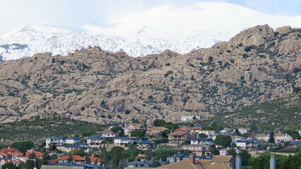 Manzanares el real madrid town on the background of la pedriza nevada tourism routes mountain range