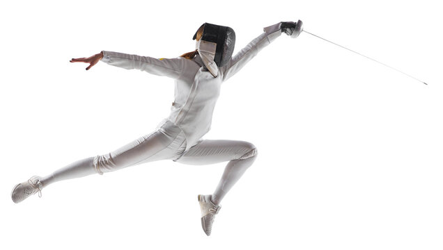 Artistry of combat. Female fencer gracefully executes complex fencing maneuver in action against transparent background. Concept of professional, sport active lifestyle, fitness, motion, strength.
