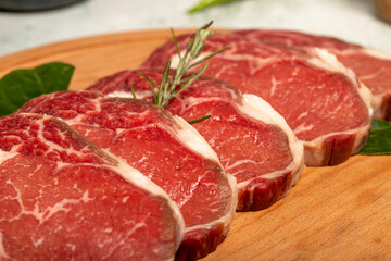 Beef entrecôte or ribeye. Butcher products. Raw beef ribeye on stone background