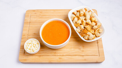 Lentil soup bowl with crackers