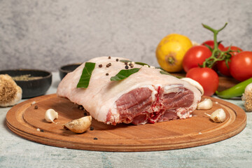 Boneless lamb back meat. Butcher products. Lamb back fillet meat on stone background. local name kuzu karski