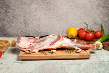 Lamb shoulder meat with bones. Butcher products. Raw lamb shoulder on stone ground