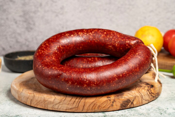 Spicy beef sausage. Butcher products. Turkish beef sausage on stone background