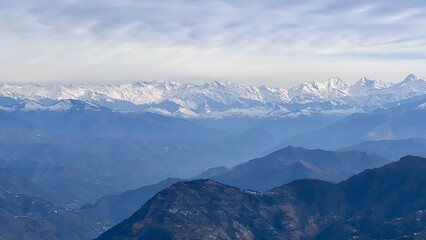 Beautiful Dalhousie City of Himachal Pradesh with Dhauladhar mountain range and snowy peaks in the...