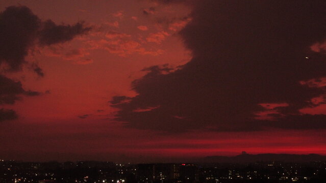 images of bogota at twilight with a beautiful red color of the sky
